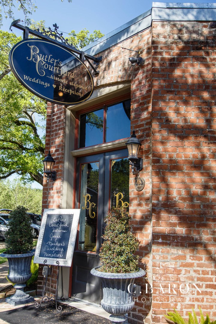 Butler's Courtyard; C. Baron Photography; Elegant; Exposed Brick; Galveston County Weddings; Historic Venue; Houston Engagement Photographer; League City; Outdoor Ceremony; Texas; Wedding Photography; Yellow; chandeliers; confetti leave; garden; sunflowers;