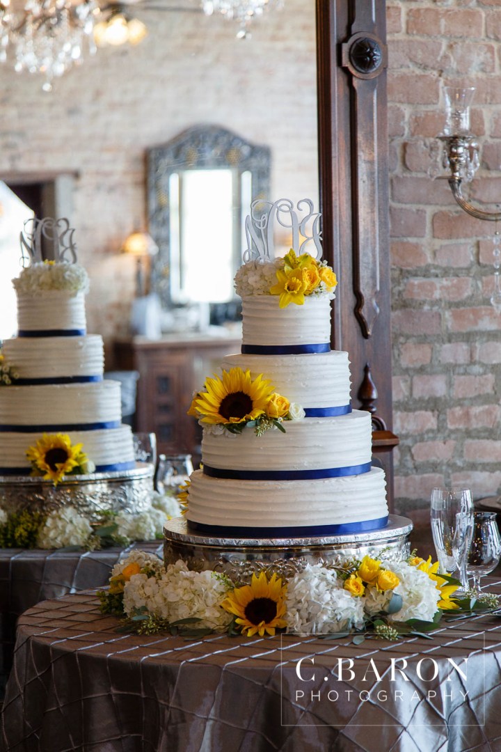 Butler's Courtyard; C. Baron Photography; Elegant; Exposed Brick; Galveston County Weddings; Historic Venue; Houston Engagement Photographer; League City; Outdoor Ceremony; Texas; Wedding Photography; Yellow; chandeliers; confetti leave; garden; sunflowers;