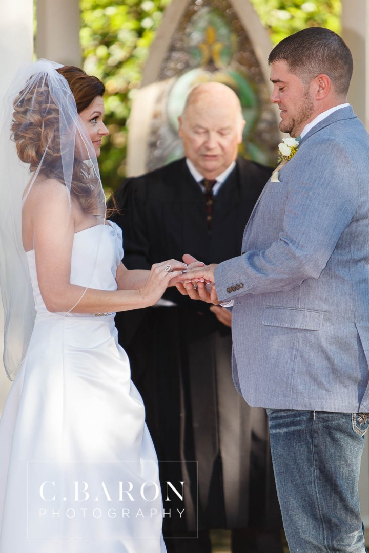 Butler's Courtyard; C. Baron Photography; Elegant; Exposed Brick; Galveston County Weddings; Historic Venue; Houston Engagement Photographer; League City; Outdoor Ceremony; Texas; Wedding Photography; Yellow; chandeliers; confetti leave; garden; sunflowers;