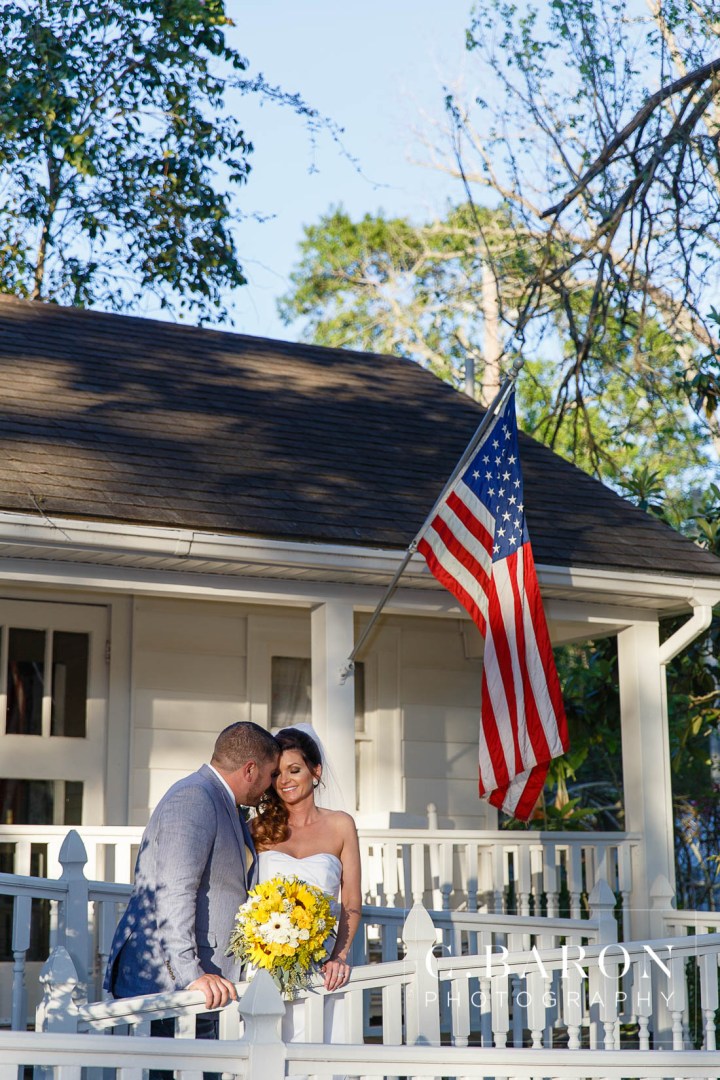 Butler's Courtyard; C. Baron Photography; Elegant; Exposed Brick; Galveston County Weddings; Historic Venue; Houston Engagement Photographer; League City; Outdoor Ceremony; Texas; Wedding Photography; Yellow; chandeliers; confetti leave; garden; sunflowers;