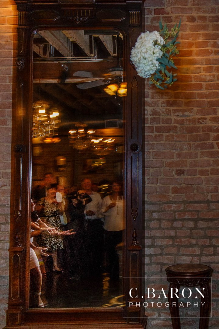 Butler's Courtyard; C. Baron Photography; Elegant; Exposed Brick; Galveston County Weddings; Historic Venue; Houston Engagement Photographer; League City; Outdoor Ceremony; Texas; Wedding Photography; Yellow; chandeliers; confetti leave; garden; sunflowers;