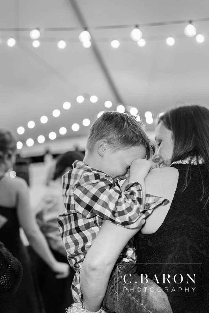 Butler's Courtyard; C. Baron Photography; Elegant; Exposed Brick; Galveston County Weddings; Historic Venue; Houston Engagement Photographer; League City; Outdoor Ceremony; Texas; Wedding Photography; Yellow; chandeliers; confetti leave; garden; sunflowers;