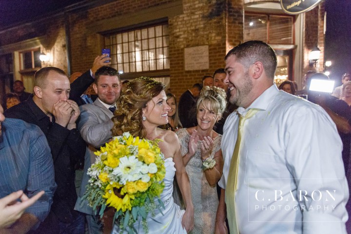 Butler's Courtyard; C. Baron Photography; Elegant; Exposed Brick; Galveston County Weddings; Historic Venue; Houston Engagement Photographer; League City; Outdoor Ceremony; Texas; Wedding Photography; Yellow; chandeliers; confetti leave; garden; sunflowers;