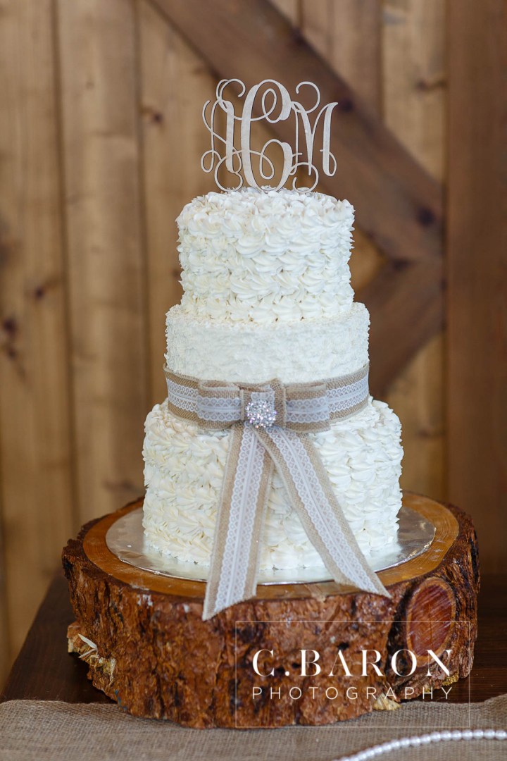 Austin Wedding Photographer; Barn; Beaumont wedding Photographer; C. Baron Photography; Church Pews; College Station wedding Photographer; Conroe; Conroe Wedding Photograher; Coral; Cowboy boots; Galveston Wedding Photographer; Houston wedding Photographer; Lake; Long Veil; Long-sleeved gown; Money Dance; Montgomery; Montgomery Wedding PHotographer; Old Ford; Outdoor Ceremony; Peach; Rustic; Shoe Game; Sparkler Exit; Spring; Texas; The Carriage House; Woodlands Wedding Photographer; arch; burlap; chandeliers; cowboy hat; lace; lace dress;