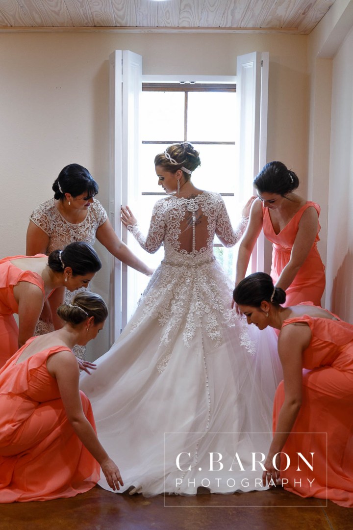 Austin Wedding Photographer; Barn; Beaumont wedding Photographer; C. Baron Photography; Church Pews; College Station wedding Photographer; Conroe; Conroe Wedding Photograher; Coral; Cowboy boots; Galveston Wedding Photographer; Houston wedding Photographer; Lake; Long Veil; Long-sleeved gown; Money Dance; Montgomery; Montgomery Wedding PHotographer; Old Ford; Outdoor Ceremony; Peach; Rustic; Shoe Game; Sparkler Exit; Spring; Texas; The Carriage House; Woodlands Wedding Photographer; arch; burlap; chandeliers; cowboy hat; lace; lace dress;