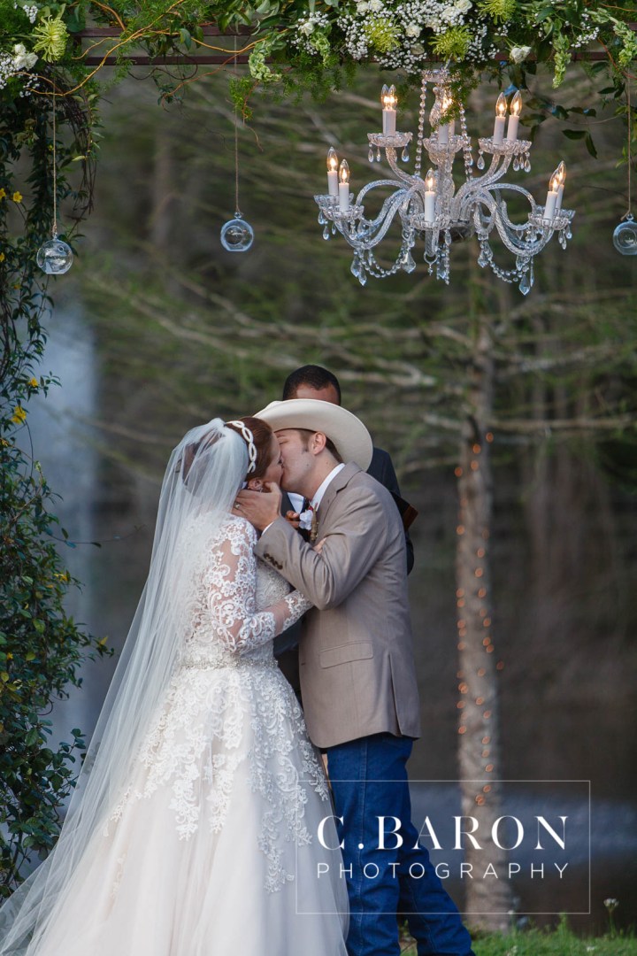 Austin Wedding Photographer; Barn; Beaumont wedding Photographer; C. Baron Photography; Church Pews; College Station wedding Photographer; Conroe; Conroe Wedding Photograher; Coral; Cowboy boots; Galveston Wedding Photographer; Houston wedding Photographer; Lake; Long Veil; Long-sleeved gown; Money Dance; Montgomery; Montgomery Wedding PHotographer; Old Ford; Outdoor Ceremony; Peach; Rustic; Shoe Game; Sparkler Exit; Spring; Texas; The Carriage House; Woodlands Wedding Photographer; arch; burlap; chandeliers; cowboy hat; lace; lace dress;