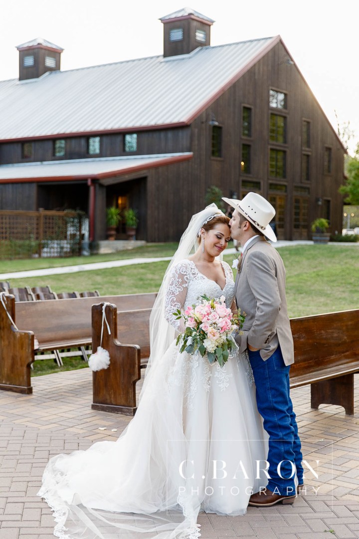 Austin Wedding Photographer; Barn; Beaumont wedding Photographer; C. Baron Photography; Church Pews; College Station wedding Photographer; Conroe; Conroe Wedding Photograher; Coral; Cowboy boots; Galveston Wedding Photographer; Houston wedding Photographer; Lake; Long Veil; Long-sleeved gown; Money Dance; Montgomery; Montgomery Wedding PHotographer; Old Ford; Outdoor Ceremony; Peach; Rustic; Shoe Game; Sparkler Exit; Spring; Texas; The Carriage House; Woodlands Wedding Photographer; arch; burlap; chandeliers; cowboy hat; lace; lace dress;