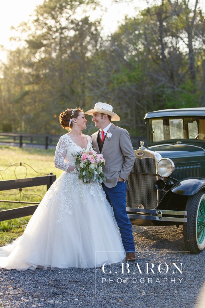 Austin Wedding Photographer; Barn; Beaumont wedding Photographer; C. Baron Photography; Church Pews; College Station wedding Photographer; Conroe; Conroe Wedding Photograher; Coral; Cowboy boots; Galveston Wedding Photographer; Houston wedding Photographer; Lake; Long Veil; Long-sleeved gown; Money Dance; Montgomery; Montgomery Wedding PHotographer; Old Ford; Outdoor Ceremony; Peach; Rustic; Shoe Game; Sparkler Exit; Spring; Texas; The Carriage House; Woodlands Wedding Photographer; arch; burlap; chandeliers; cowboy hat; lace; lace dress;