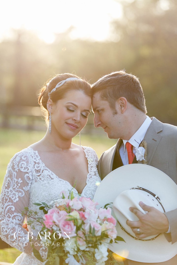 Austin Wedding Photographer; Barn; Beaumont wedding Photographer; C. Baron Photography; Church Pews; College Station wedding Photographer; Conroe; Conroe Wedding Photograher; Coral; Cowboy boots; Galveston Wedding Photographer; Houston wedding Photographer; Lake; Long Veil; Long-sleeved gown; Money Dance; Montgomery; Montgomery Wedding PHotographer; Old Ford; Outdoor Ceremony; Peach; Rustic; Shoe Game; Sparkler Exit; Spring; Texas; The Carriage House; Woodlands Wedding Photographer; arch; burlap; chandeliers; cowboy hat; lace; lace dress;