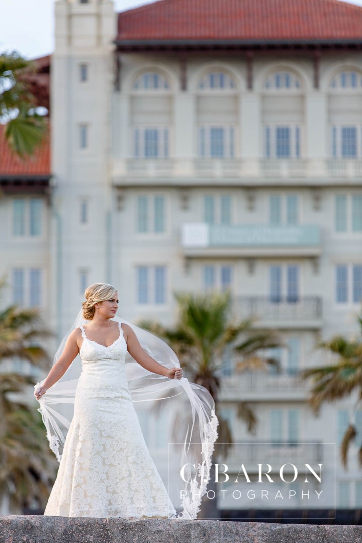 Beach; Bridals; C. Baron Photography; Formals; Galveston Island; Galveston Wedding Photographer; Historic Hotel; Hotel Galvez; Houston wedding Photographer; Lace gown; Palm Trees; Seaside; Seawall; Spring; Texas Wedding Photographer; sunny afternoon;