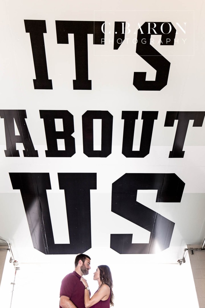 12th man; Aggie Barn; Aggie ring; Aggies; Bluebonnets; C. Baron Photography; Campus; College Station Engagement Photographer; Cowboy boots; E-session; Houston wedding Photographer; Kyle Field; Texas A&M University; Whoop; Wildflowers; maroon dress; stadium;