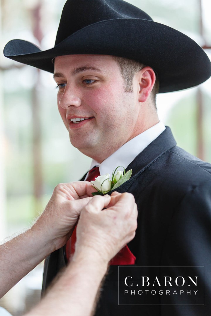Beaded capelet; C. Baron Photography; Central Christian Church; Galveston; Galveston Wedding Photographer; Garten Verein; Gold; Groom; Historical building; Horse Carriage; Impression Bridal; Island; Red Roses; Rose Petal Leave; Spring; Texas; blush lace gown; bride; cowboy hat;