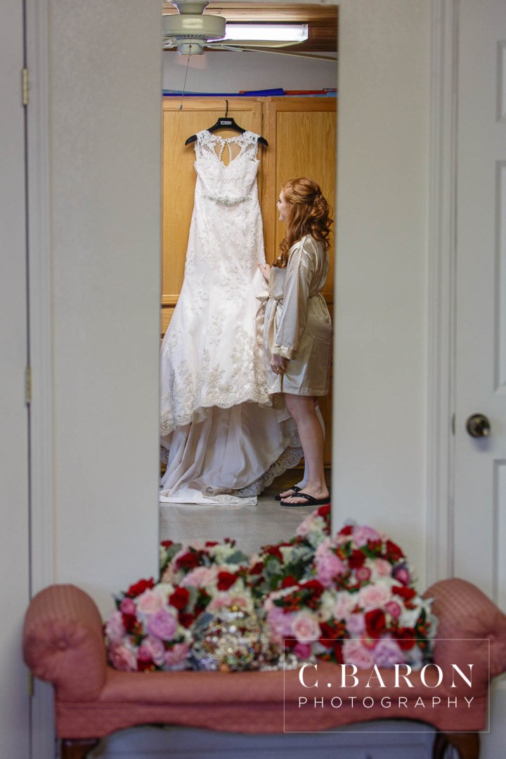 Beaded capelet; C. Baron Photography; Central Christian Church; Galveston; Galveston Wedding Photographer; Garten Verein; Gold; Groom; Historical building; Horse Carriage; Impression Bridal; Island; Red Roses; Rose Petal Leave; Spring; Texas; blush lace gown; bride; cowboy hat;