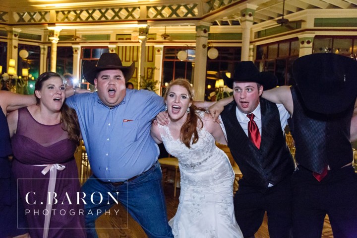 Beaded capelet; C. Baron Photography; Central Christian Church; Galveston; Galveston Wedding Photographer; Garten Verein; Gold; Groom; Historical building; Horse Carriage; Impression Bridal; Island; Red Roses; Rose Petal Leave; Spring; Texas; blush lace gown; bride; cowboy hat;