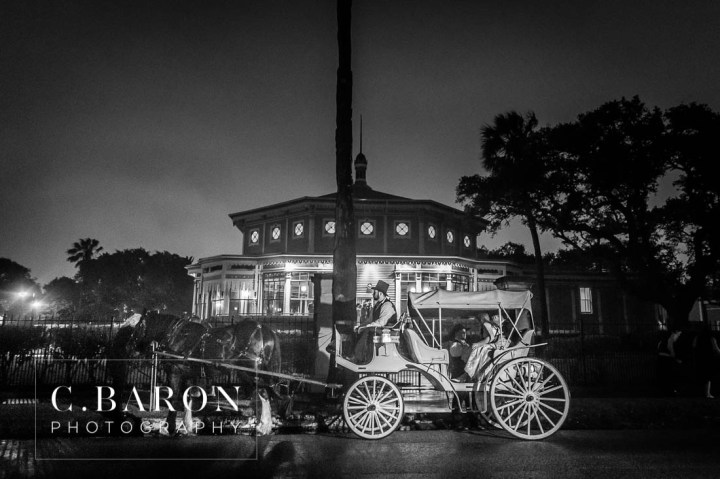 Beaded capelet; C. Baron Photography; Central Christian Church; Galveston; Galveston Wedding Photographer; Garten Verein; Gold; Groom; Historical building; Horse Carriage; Impression Bridal; Island; Red Roses; Rose Petal Leave; Spring; Texas; blush lace gown; bride; cowboy hat;