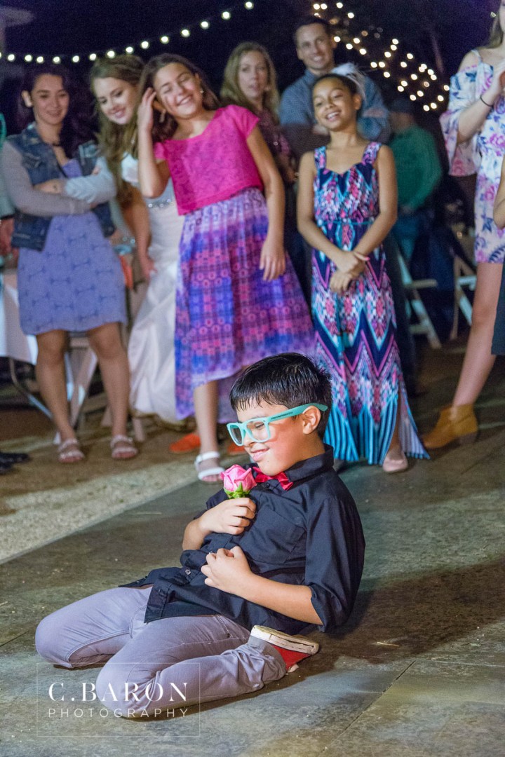 Alvin; C. Baron Photography; Charcoal Gray; Coral; Cowboy boots; Grey; Houston wedding Photographer; Oakwind Manor; Outdoor Ceremony; Outdoor reception; Patriotic; Peach; Red Barn; Sparkler Leave; Texas; Texas Barn; Tom's; Unity Cross; corvette; flag; strapless gown;