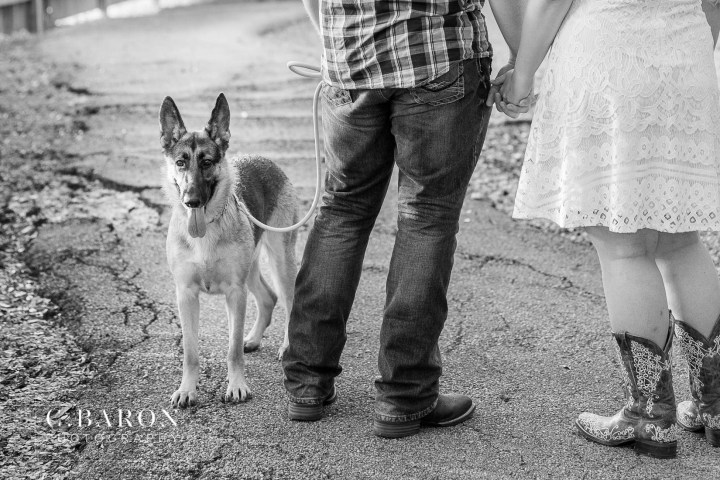 C. Baron Photography; Cowboy boots; Dog; E-session; Engagement session; Fur Baby; German Shepherd; Houston Engagement Photographer; Nature; Park; Pond; Tomball Engagement photographer; Woodlands Engagement Photographer; dock; lace dress; log cabin;