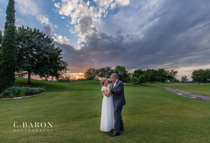 C. Baron Photography; Church ceremony; Houston wedding Photographer; Pink Roses; Rainy Day; Reception; Sparklers; Sugar Land United Methodist Church; Sugar Land Weddings; Sugarland Texas; Tea Length; blush; pink uplighting; summer; sunset;