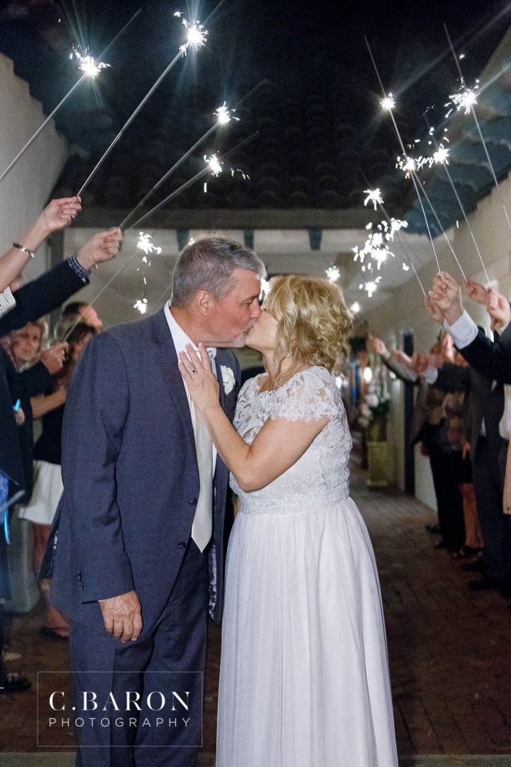 C. Baron Photography; Church ceremony; Houston wedding Photographer; Pink Roses; Rainy Day; Reception; Sparklers; Sugar Land United Methodist Church; Sugar Land Weddings; Sugarland Texas; Tea Length; blush; pink uplighting; summer; sunset;