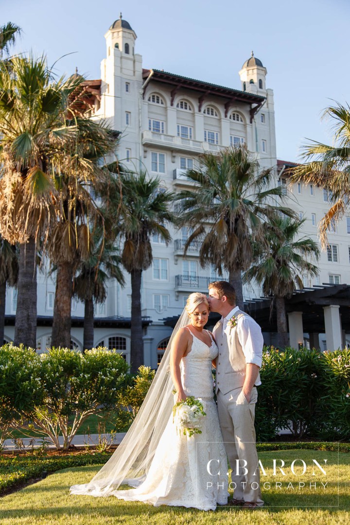 Anniversary Dance; Beach; Carriage; Centennial Lawn; Christian Louboutin; Galveston Island; Galveston Wedding Photographer; Gold; Hankies; Hansom cab; Hotel Galvez; Houston wedding Photographer; Lace gown; Music Hall; Naked cake; Outdoor Ceremony; Palm Trees; Pink; Ribbon Wands; Seawall; blush; champagne; embroidered handkerchief; flower crown; horse; hydrangea; strings;