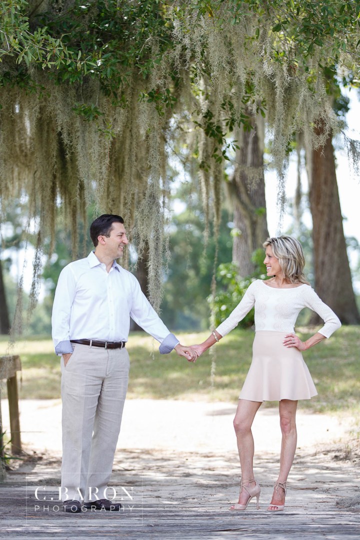 C. Baron Photography; Engagement session; Golf Cart; Houston Texas; Houston wedding Photographer; Raveneaux Country Club; afternoon; golf course; summer;