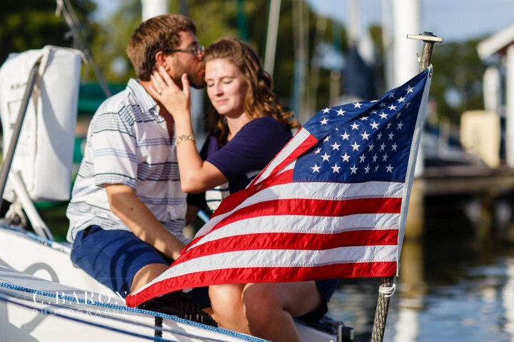 C. Baron Photography; Clear Lake Wedding Photographer; E Session; Engagement session; Houston wedding Photographer; Lakewood Yacht Club; Marina; Masts; Nautical; Nautical Engagement session at the Lakewood Yacht Club in Seabrook Texas; On the water; Sailboat; Seabrook; Texas; Trimaran; Nautical Engagement session at the Lakewood Yacht Club in Seabro; sandals; summer; sunset;