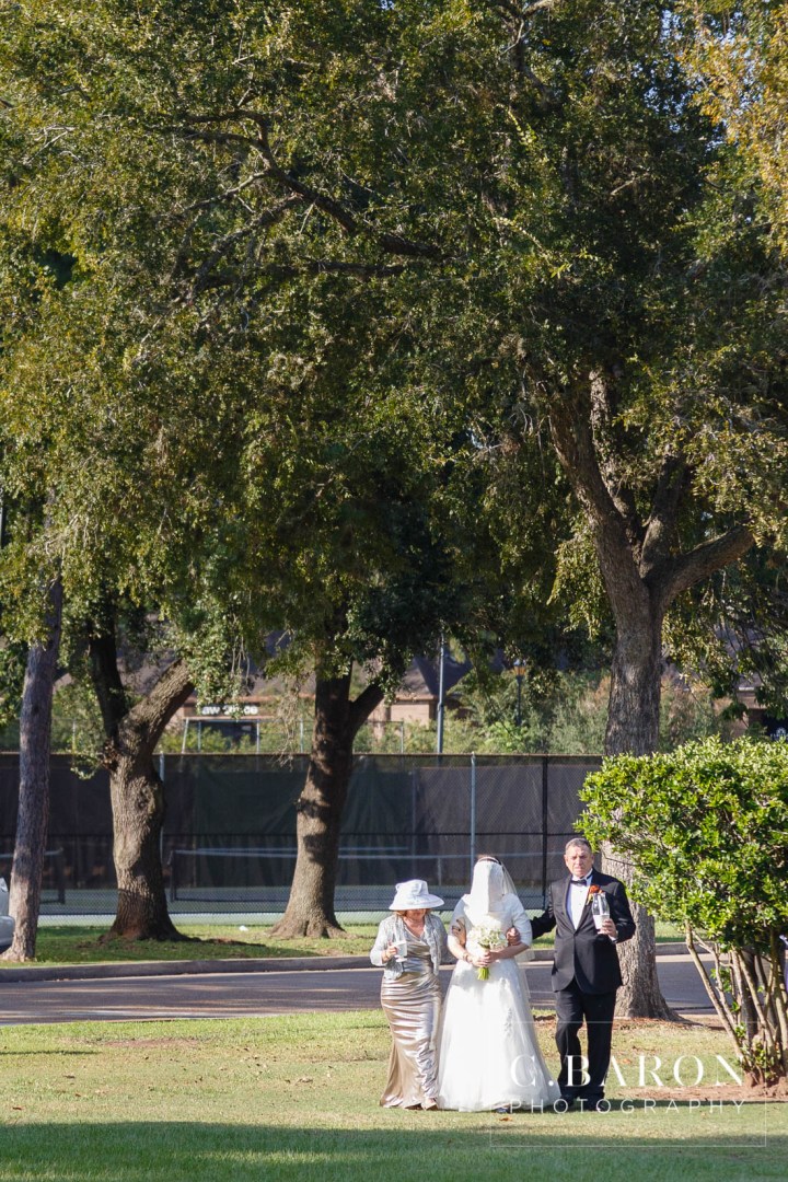 C. Baron Photography; Houston Wedding Photography; Ketubah; Orthodox Jewish wedding ceremony; Outdoor ceremony Chuppah; Sugar Creek Country Club; Sugar Land; Sugarland; Texas; Traditional; summer;