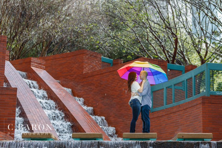 C. Baron Photography; Engagement session; Galveston Wedding Photographer; Houston Engagement Photographer; Houston wedding Photographer; Rainy Day; Sesquicentennial Park; buffalo bayou; downtown Houston; skyline; stormy; winter;