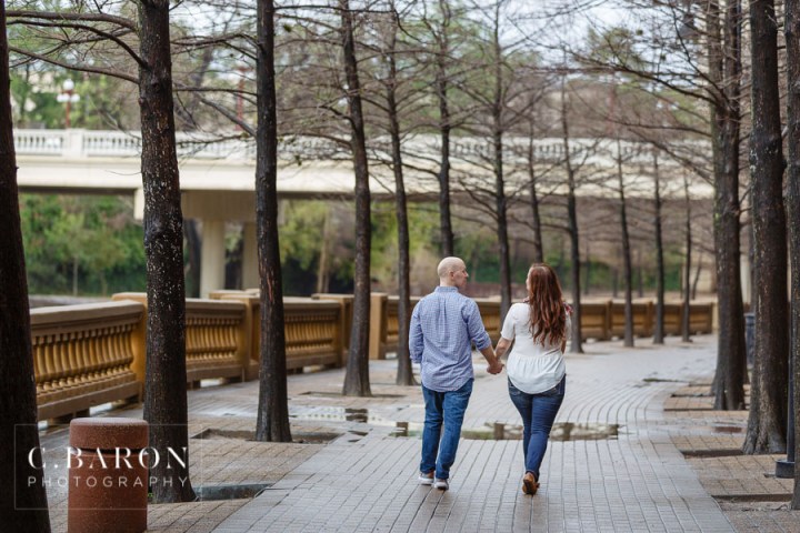 C. Baron Photography; Engagement session; Galveston Wedding Photographer; Houston Engagement Photographer; Houston wedding Photographer; Rainy Day; Sesquicentennial Park; buffalo bayou; downtown Houston; skyline; stormy; winter;