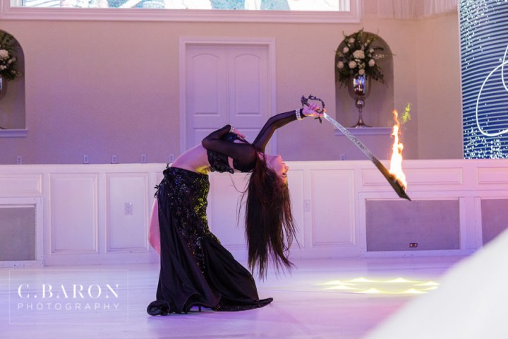 Ballet Folklorico; Belly Dancer; Black Tie; C. Baron Photography; Elegant; Houston Wedding Videographer; Houston wedding Photographer; Outdoor Ceremony; Sans Souci; Sparkler Leave; Tented; Traditional; Tulle gown; blush; chandeliers; fire dancing; lavendar; purple; sword dancing;
