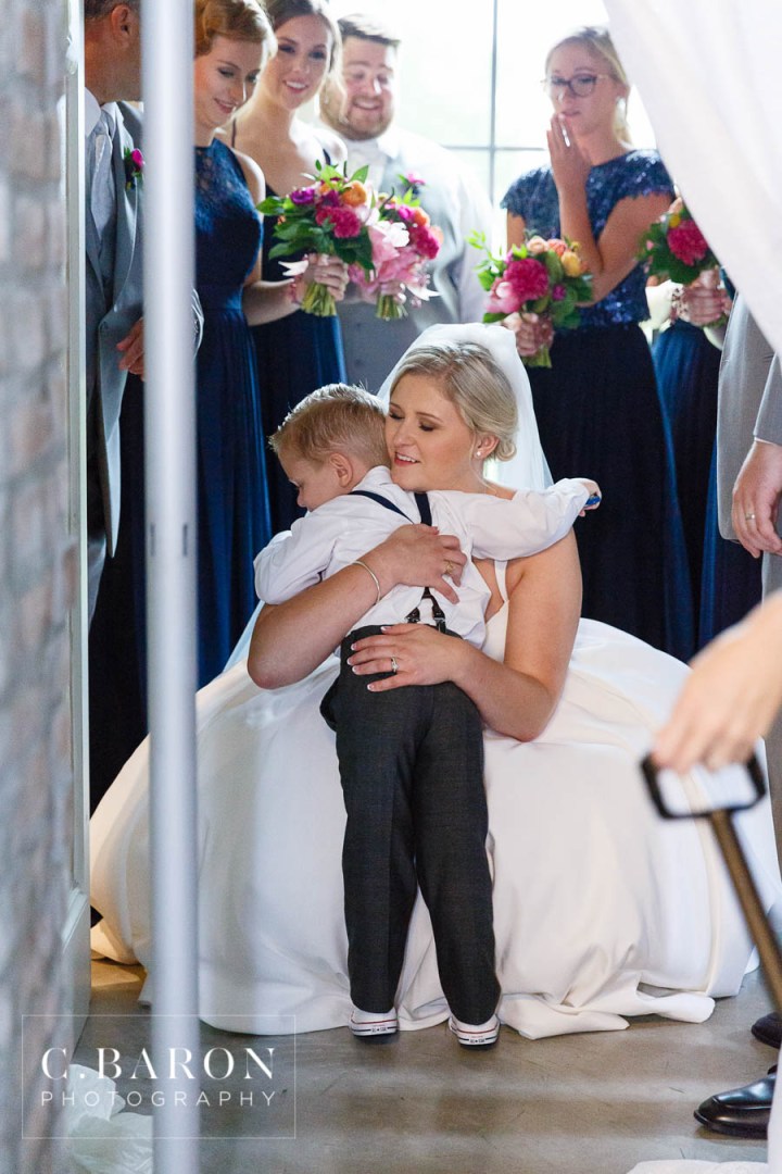 Aggie War Hymn; Aggie Wedding; C. Baron Photography; Converse; Glam; Glow Stick Leave; Houston Wedding cinematographer; Houston wedding Photographer; Jewel Tones; La Torretta in Conroe Texas; Montgomery Texas; Montgomery Weddings; Olde Dobbin Station; Summer time; Texas A&M; Texas Weddings; rain on wedding day; rolls royce;