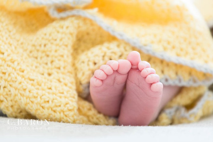 At Home Newborn session; C. Baron Photography; Family Photographer; Family Portraits; Houston Texas; Houston baby Photographer; Lifestyle Photography; Newborn Photographer; Nursery; Pink; Target; Texas Photographer; Wild Forever Nursery; farmhouse style; sunflowers;
