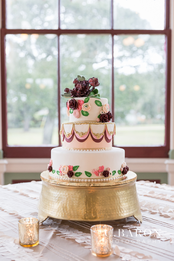 A Particular Event; Adorne Artistry; C. Baron Photography; Cakes by Jula; Carriage Caterers; Galveston Historical Foundation; Galveston Island Texas; Galveston Wedding Photographer; Galveston Weddings; Garten Verein; HH Design House; Houston Wedding PHotographer; Indoor ceremony; Kempner Park; Maroon; Maroon tux; Peach; Pearls; Red; Rolls Royce; Scarlet; Something Blue Bridal; Victorian; Vintage Limo; Wedding gown with pockets; Wine; Wine colored tux; crimson; gold; loose florals; rainy day; rose gold crystal belt; traditional; winter;