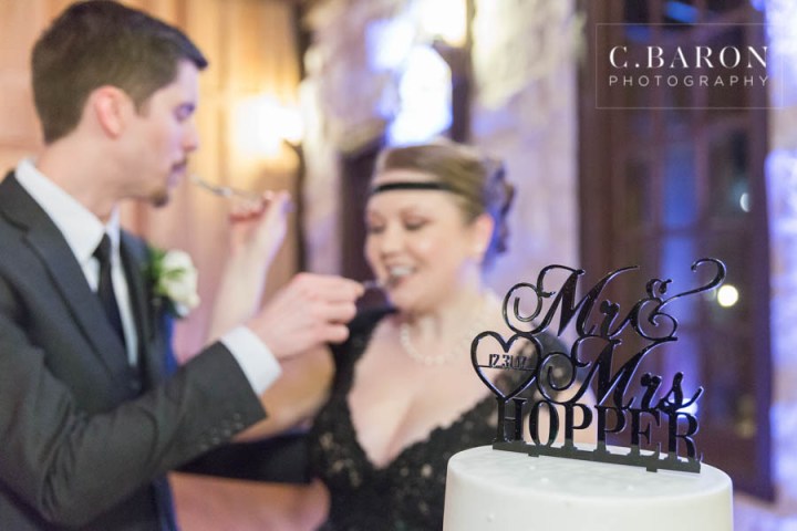 20s; Blush gown with black lace top and appliques; Bubble exit; Gatsby; Glamour; Gold; Magnolia Texas; New Years Eve Wedding; Springs Events; The Springs in the Woodlands; White; art deco; chandeliers; flappers; grand march; pearls;