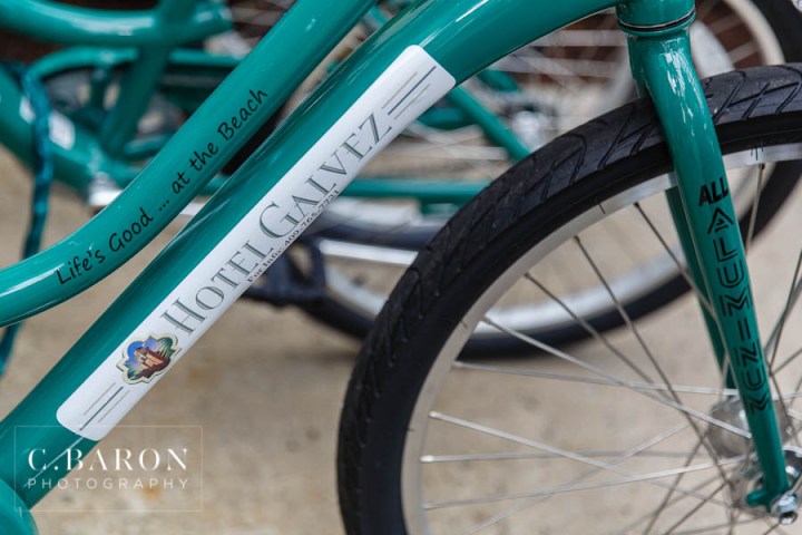 Blue; C. Baron Photography; Casablanca lilies; Ceremony; Cinderella cake; Couple; Galveston; Galveston Wedding Photographer; Groom; Hotel Galvez; Houston wedding Photographer; Music Hall; Reception; Sand; Seawall; Spring; Strapless; Teal; Texas; blue galaxy orchid; bride; confetti; dendrobium; first look; lace; purple; rain; singapore orchid;