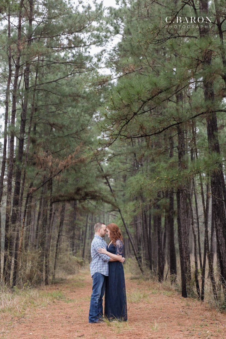 C. Baron Photography; East Texas; Engagement Session in the woods; Houston wedding Photographer; Nature; Red Head; The Woodlands; Woodlands Engagement Photographer; forest; pine trees; winter;