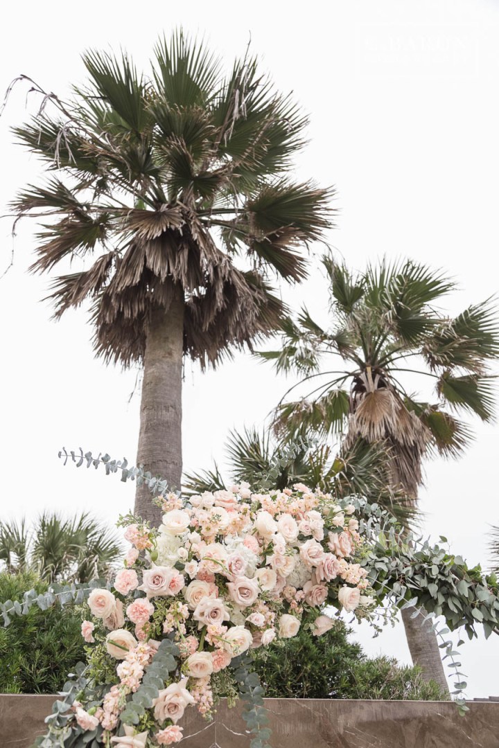 Aggie War Hymn; Ballroom reception; Beach; C. Baron Photography; Classic Wedding; Floral Hoop at Altar; Galveston Island Texas; Galveston Wedding Photographer; Glow Stick Exit; Hotel Galvez & Spa; Oleander Garden; Peonies; Pink; Roses; Round Wedding Arch; Seaside; Seawall; Sequin Bridesmaid; Spring; Veranda; blush;