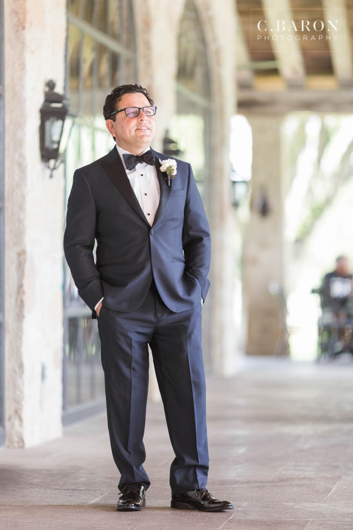 15th century French chapel; C. Baron Photography; Classic; Elegant; Gold; Groom; Houston Oaks Country Club; Houston wedding Photographer; Johanna Terry Events; Lakeside ceremony; Mariachi band; Outdoor Ceremony; PIper and Muse Events; Pink; Sparkler Exit; The Clubs at Houston Oaks; Vintage Rolls Royce; beaded dress; black bowtie; black suit; blush; brunette; first look; flower archway; glasses; greenery; hair piece; half updo; lantern release; outdoor portraits; strapped dress;