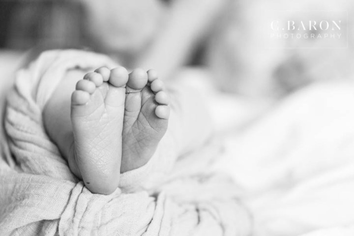 Lifestyle Newborn session in home in Houston Texas