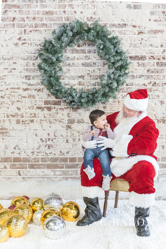 Cute Christmas Santa mini sessions at downtown Houston Texas stu